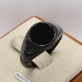 Polished black stainless steel signet ring with a round black onyx-style stone inlay - Electric Black Stone