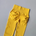 Bright yellow high-waisted yoga pants with scrunch butt lifting design for fitness - Light Yellow