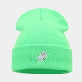Detail of mint green ribbed knit beanie with white cartoon ghost embroidery on the cuff - Neon Green