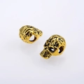 Antique gold skull beads for jewelry making with vintage skeleton detail and hole - Antique Gold