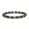 Detail of red garnet stone beads with silver metallic spacers on a handmade bracelet - 6mm Hematite & Garnet