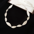 Close-up of silver metal leaf waist chain with hammered texture and adjustable lobster clasp - Hammered Willow Leaf Style (4#) / Silver