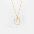Close-up of gold 925 silver oval pendant with micro-paved crystals and letter E - Letter E