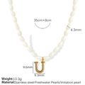 Gold stainless steel pearl necklace featuring a letter U pendant with product dimensions - Letter U (Gold-Tone Artificial Pearl Necklace)