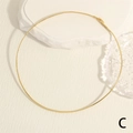 Dettaglio di una catena a serpente placcata in oro 18 carati su fondo bianco - Catena Piatta alla Moda (NE2144-C)