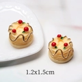 Detailed close-up of a 1.2x1.5cm miniature resin cake model with red cherry for DIY crafts - Yellow Heart Strawberry