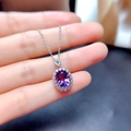 Silver necklace with a purple oval gemstone pendant surrounded by white cubic zirconia - Tz-4 [matching Chain]