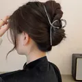 Elegant gunmetal silver butterfly hair claw clip for women in a minimalist metal design - Large Cross Twisted Streamline Style / Oversized / Black / Gunmetal
