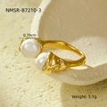 Detailed macro view of gold-plated titanium steel open ring with 7.9mm white pearls - Lava Texture Medium Pearl Open Style (NMSR-B7210-3)