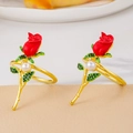 Luxurious gold napkin ring with red 3D rose flower, green crystal leaves, and white pearl - Pearl Rose