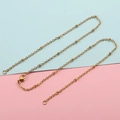 Collana in acciaio inossidabile dorato con piccole perle e chiusura a moschettone - 2mm/45cm / Oro