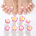 Detail view of silicone toe separators with daisy flower designs for nail art pedicure - Pink Yellow Gradient Daisy Style (09)