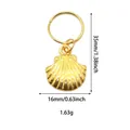 Detailed view of golden shell pendant for hair charms with 35mm height and 16mm width - Metal Shell