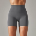 Detailed view of high-waist yoga shorts showing flexible fabric and seamless stitching - Dark Gray
