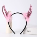 Detail of pink devil horn headband featuring metallic leather finish and soft feathers - Metallic Pink Horns + Pink Feather + Black Headband