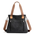 Minimalist black canvas tote bag with brown straps and dual front zippers on white background - 35cm x 32cm x 12cm / Black