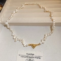 Detail of baroque pearl necklace featuring a golden heart-shaped magnetic clasp closure - Gold Heart Magnetic Clasp Style (Freshwater Pearl)