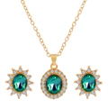 Elegant gold jewelry set featuring emerald green oval stones and diamond halo accents - Green Oval Halo Gemstone Set (05 Rose Gold# Green M-148)