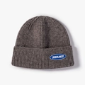 Dark gray knitted beanie with blue letter patch and warm ribbed winter texture - Dark Grey (21B024)