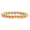 Elegant gold pearl bracelet with round beads and lustrous finish on white background - Gold/Yellow
