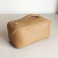 Large capacity beige faux leather makeup bag with top handle and golden zipper - Khaki