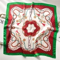 Elegant green and red silk scarf with heart chain pattern tied on a handbag - Green Border Red