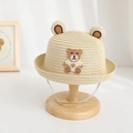 Close-up of beige straw hat featuring plush bear ears and detailed bear embroidery - Beige / Hat