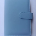 Smoky blue PU leather macaron binder cover with buckle and visible stitching texture - Matte Blue