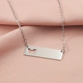 Detailed view of silver necklace with hollow butterfly rectangle pendant on pink silk fabric - Hollow Butterfly Style (MP340-5) / Steel