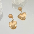 Exquisite golden heart-shaped drop earrings with a polished finish for a luxury look - Gold (A-1422)