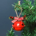 Red Christmas bell with star cutouts, red-white plaid bow, and berries on twine - Red Round Bell