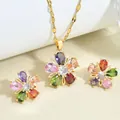 Macro detail of gold flower necklace and earrings set with vibrant colorful zircon stones - Multi-color Zirconia Flower Necklace & Earrings Set / Gold