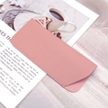 Pink PU leather glasses sleeve with fine stitching on an aesthetic book background - Small / Pink Flat Grain