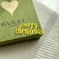 Macro detail of yellow acrylic Merry Christmas cake topper on luxury gift packaging - Gold / Medium Style A / Plus Thick Style