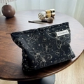 Black cosmetic bag with gold butterfly pattern on a wooden table with brushes - Gold Thread Butterfly Black