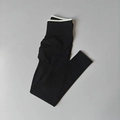 Flachgelegte nahtlose Yogahose mit hoher Taille und weißen Kontrastdetails am Bund - S / Schwarz