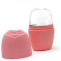 Detailed view of pink rose-shaped silicone ice roller with a formed ice cube for face massage - Rose Style - Pink