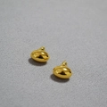 Polished gold oval stud earrings with mirror finish on grey textured background - Large Gold
