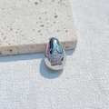 Silver teardrop pendant with star-shaped zircon on a beige textured stone base - Star Style / Silver