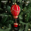 Red velvet hot air balloon Christmas ornament with gold beads and warm tree lighting - Red Hot Air Balloon
