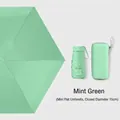 Mint green mini flat umbrella with 15cm capsule storage case for sun and rain protection - Box Packaging / Light Green
