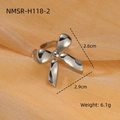 Polished silver stainless steel bow ring on elegant orange silk background texture - Silver Bowknot Opening Ring (NMSR-H118-2)