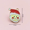 Detail view of Santa Claus enamel charm with 2.1cm x 1.7cm dimensions on pink background - 2406 Standing Santa B