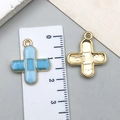 Light blue enamel cross pendant in gold finish for DIY jewelry and keychains - Blue Band-Aid