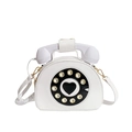Creative white leather crossbody bag in a vintage telephone shape with rotary dial - White