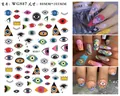 Detailed view of evil eye nail stickers with graffiti art patterns and application examples - WG887