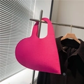 Hot pink heart-shaped felt handbag with cutout handle for a trendy minimalist style - Rose Red