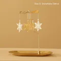 Golden spinning snowflake candle holder charm, 18.5cm tall, stainless steel metal finish - Magnetic Snowflake (No Tray)