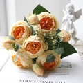 Detail of champagne artificial peony bouquet with realistic petals and rose buds - Yellow