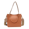 Minimalist orange bucket bag with metal handle and striped fabric crossbody strap - Orange